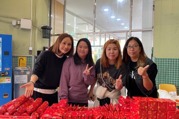 The PTA committee members prepared a table full of beautifully wrapped red Bingo game prizes. Even before the game started, everyone was already thrilled!